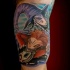 Cartoon style colored shoulder tattoo of Nightmare before Christmas heroes