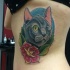 Cartoon style colored side tattoo of amazing cat with flowers