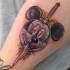 Cartoon style funny looking Mickey Mouse head with dagger