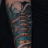 Cartoon style little forearm tattoo of Asian temple and bamboo