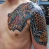 Celtic style colored shoulder and chest tattoo of big dragon