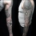 Celtic style colored sleeve tattoo of various knots