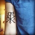Tatuaje en el brazo, cristograma  Chi Rho exclusivo