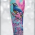 Colofull girly tattoo con pájaro en flores