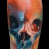 Tatuaggio sulla gamba il teschio colorato