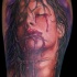 Colored horror style creepy looking leg tattoo of bloody woman