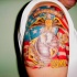 Tatuaje en el hombro colorido del ejercito de la  USMS.