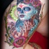 Tatuaje  de la santa muerte de varios colores