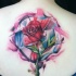 Colourful geometric rose tattoo on back