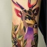 Tatuaje en el antebrazo,
ciervo bonito abigarrado