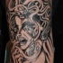 Tatuaje Medusa seductiva en negro y blanco como en el comic