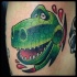Cool cartoon like funny colored dinosaur head tattoo