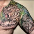 bei leopardi animali tatuaggio sulla spalla e braccio