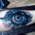 Cool aussehendes farbiges Unterarm Tattoo von mystischem Auge mit Sternen