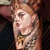 Cored incredible looking thigh tattoo of creepy clown with crown
