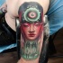 Creepy colored horror style shoulder tattoo of mystical Asian woman with two bloody sisters