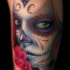 raccapricciante ragazza giorno dei morti con occhi verdi tatuaggio
