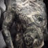 Creepy horror style black ink whole body tattoo of various monsters and animals