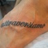 Tatuaje en el pie, frase italiana