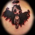 Tatuaggio stilizzato l'angelo nero rosso