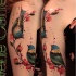 Cute designed colored shoulder tattoo of nice birds and blooming tree branch