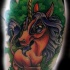 Tatuaje  de unicornio joven fantástico divertido