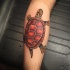 Cute original design colored crawling turtle leg detailed tattoo