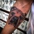 Tatuaje en el antebrazo,
retrato de  perro hermoso