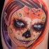 carina rossa santa muerte ragazza tatuaggio