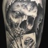 Death and playing cards tattoo