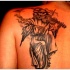 la morte suona a violino tatuaggio sulla scapola