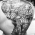 Detailed looking black and white whole back tattoo of massive gladiator fight