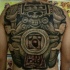 Detailed whole back tattoo of ancient sone statue