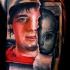 Dramatic looking colored biceps tattoo of man and baby photos