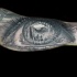 Dramaturgical 3D style very detailed human eye tattoo on forearm stylized with city sights