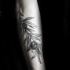 Elegant gray ink olive branch with black olives tattoo on forearm