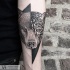 Engraving style black and white forearm tattoo of half bear half leopard