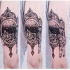 Engraving style black ink arm tattoo of beautiful mirror and human