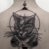 Engraving style black ink back tattoo of sleeping cat