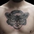 Engraving style black ink chest tattoo of woman face with butterfly shaped mask
