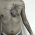 Engraving style black ink chest tattoo of gorgeous human heart