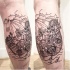 Engraving style black ink leg tattoo of sailing ship with various animals