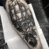 Engraving style black ink leg tattoo of sailing ship with rose