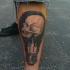 Engraving style black ink leg tattoo of bulb stylized with candles and skulls