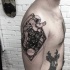 Engraving style black ink shoulder tattoo of large space man with stars