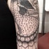 Engraving style black ink shoulder tattoo of little raccoon