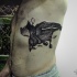Engraving style black ink side tattoo of human flying on bird