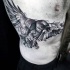 Engraving style black ink side tattoo of flying crow