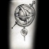 Engraving style black ink tattoo of science globe with planet
