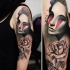Engraving style colored half sleeve tattoo of mystical woman with rose
